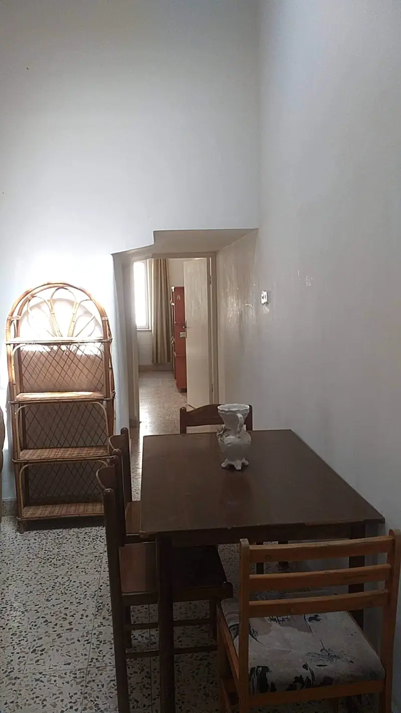The dining corner and the hallway to the bedrooms